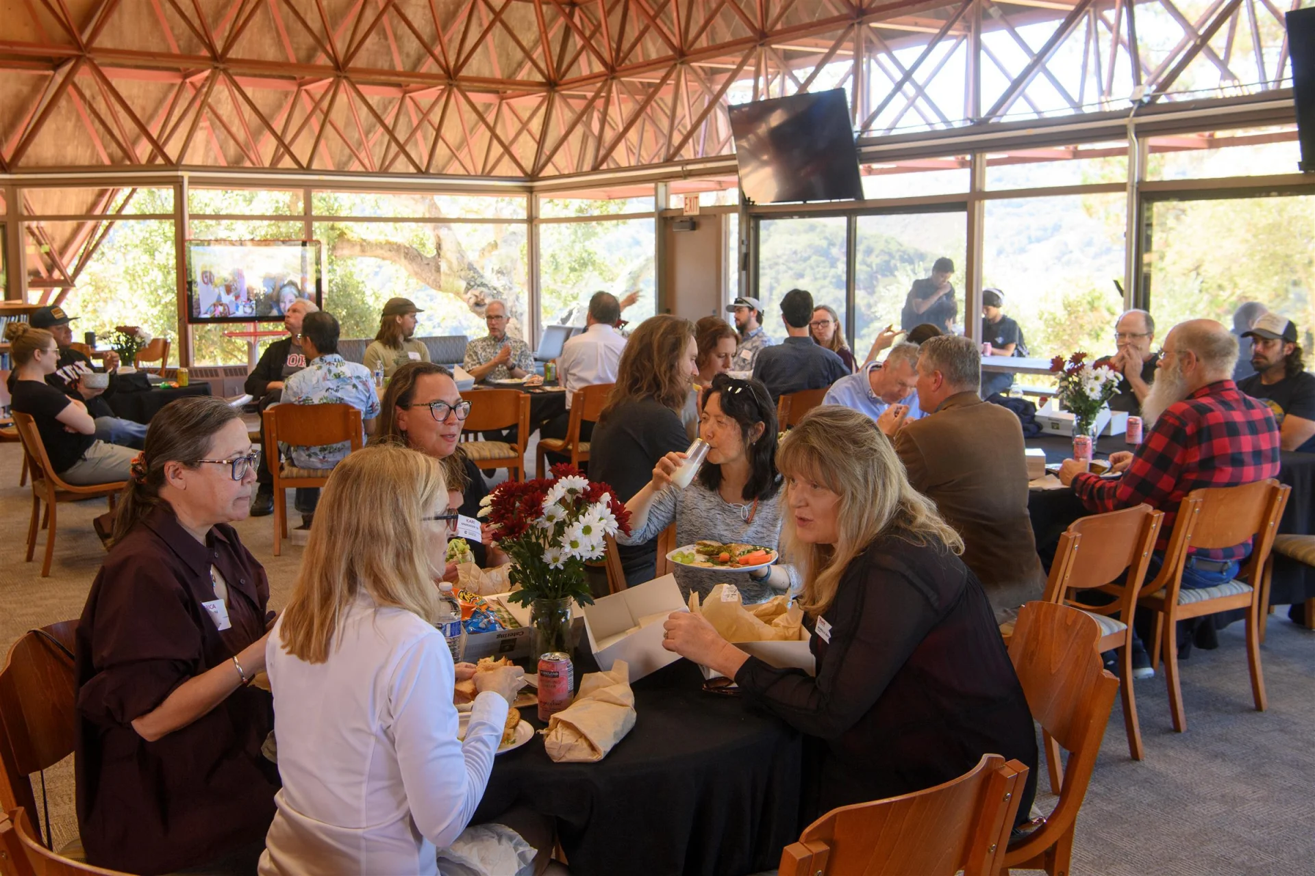reunion attendees at dinner tables