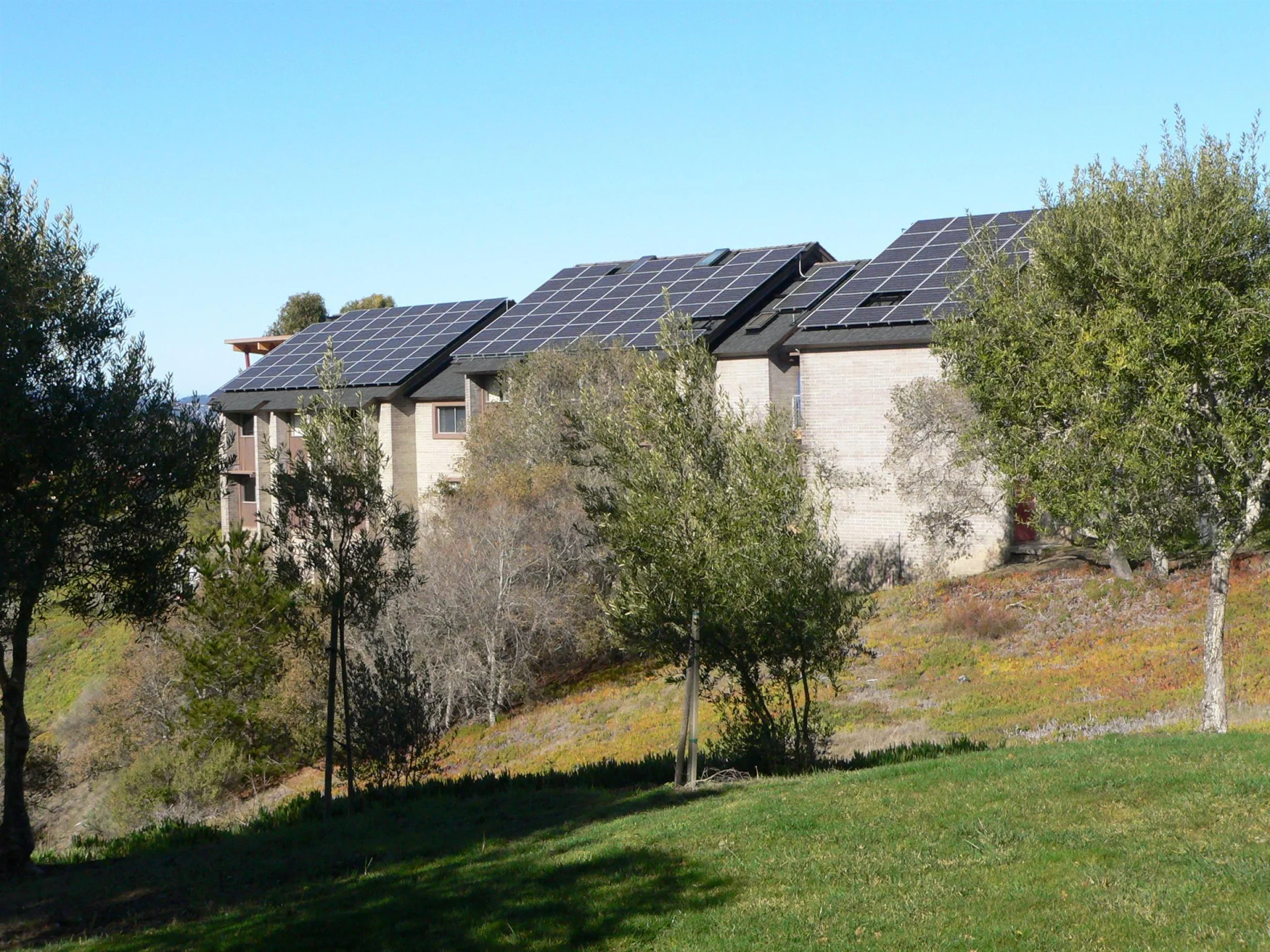 school building with solar panels on roof