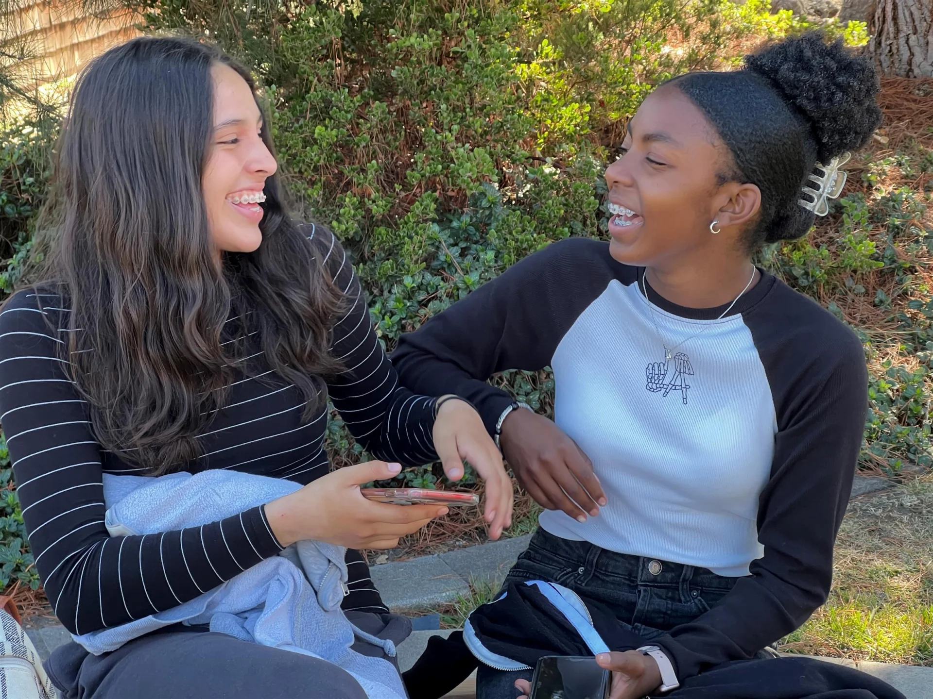 two students laughing together